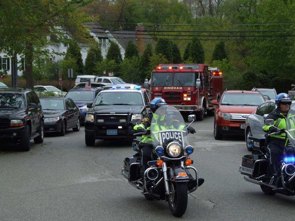CPL John Marquardt returns by Police-Fire escort